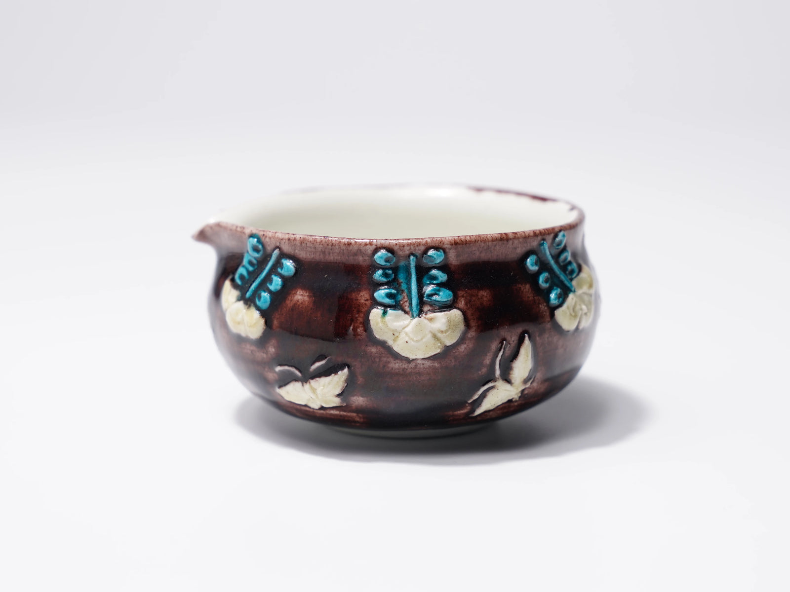 色釉片口注器