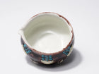 色釉片口注器